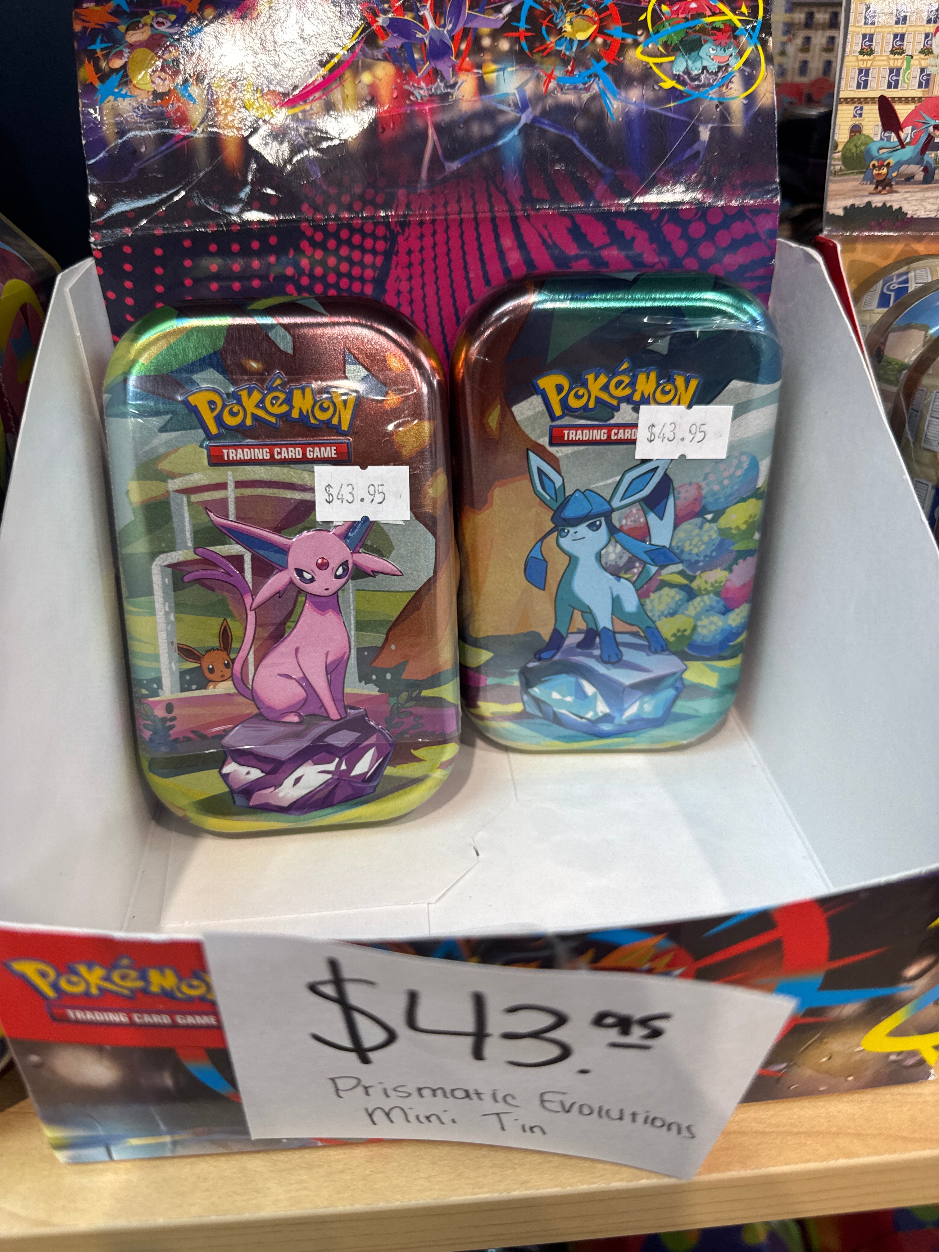 Prismatic Evolutions Mini Tin